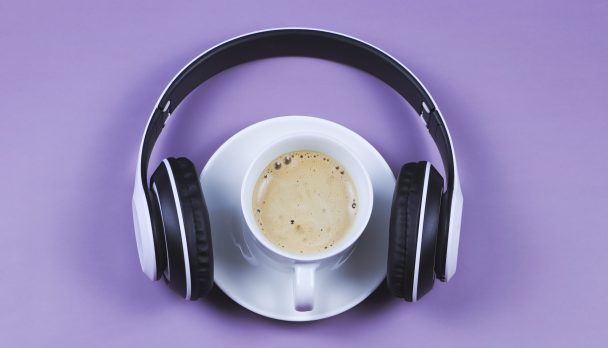 Top,View,Or,Flat,Lay,Of,Headphones,And,Coffee,Cup