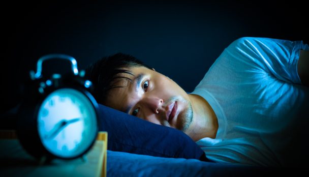 Asian,Man,In,Bed,Suffering,Insomnia,And,Sleep,Disorder,Thinking