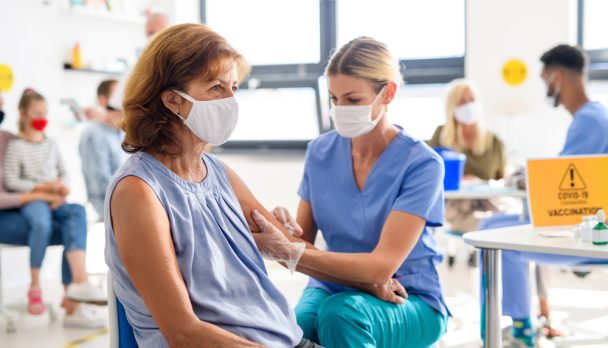 Woman,With,Face,Mask,Getting,Vaccinated,,Coronavirus,,Covid-19,And,Vaccination