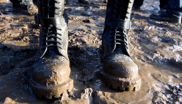 Muddy,Combat,Boots,In,The,Mud,At,The,Music,Festival